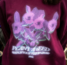 Load image into Gallery viewer, Maroon Plant A Seed sweater graphic closeup