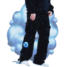 Load image into Gallery viewer, Model wearing Black oversized Bubbles Cargos With White Shoes