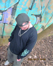 Load image into Gallery viewer, man wearing black oversized growth longsleeve t-shirt with silver chains