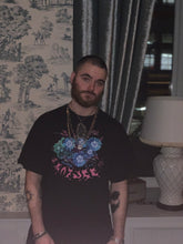 Load image into Gallery viewer, man wearing black oversized human nature t-shirt with silver chains