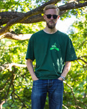 Load image into Gallery viewer, man wearing green oversized friends graphic tee