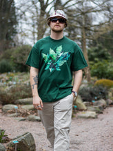 Load image into Gallery viewer, man wearing green roboflower floral t-shirt with bucket hat and shades