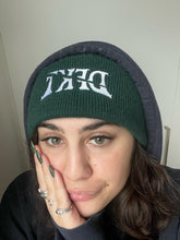 Load image into Gallery viewer, woman wearing green DFKT logo beanie