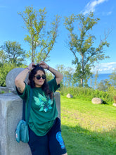 Load image into Gallery viewer, woman wearing oversized green roboflower t-shirt
