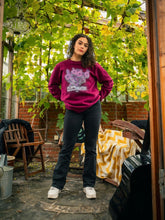 Load image into Gallery viewer, woman wearing oversized maroon plant a seed floral graphic sweater