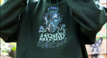 Load image into Gallery viewer, Green Mindliquid graphic hoodie graphic closeup