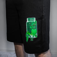 Load image into Gallery viewer, black Think Outside The jar shorts graphic closeup