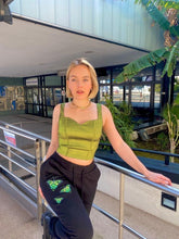 Load image into Gallery viewer, blonde woman wearing black ripped butterfly sweatpants