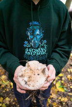 Load image into Gallery viewer, man wearing oversized green mindliquid graphic hoodie while holding mushroom
