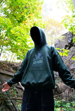 Load image into Gallery viewer, man wearing oversized green mindliquid graphic hoodie with hood up