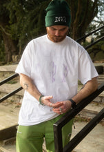 Load image into Gallery viewer, man wearing white oversized thinker graphic t-shirt with green DFKT logo beanie with lime green pants