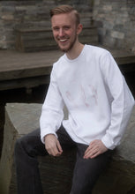 Load image into Gallery viewer, man wearing white oversized thinker sweater with black jeans and smiling big