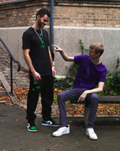 Load image into Gallery viewer, men wearing black and purple mindcontrol t-shirt and black ripped butterfly sweatpants