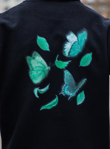 Fly Outside the Jar black Hoodie back butterfly graphic closeup