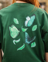 Load image into Gallery viewer, Green fly outside the jar butterfly t-shirt back graphic closeup