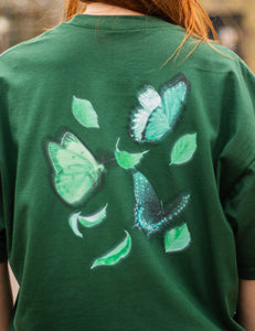 Green fly outside the jar butterfly t-shirt back graphic closeup