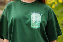 Load image into Gallery viewer, Green fly outside the jar t-shirt front graphic closeup