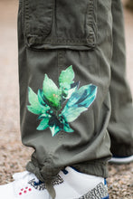 Load image into Gallery viewer, Green roboflower cargos floral graphic closeup