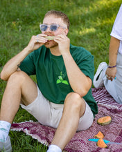 Load image into Gallery viewer, Man wearing green friends t-shirt eating watermelon