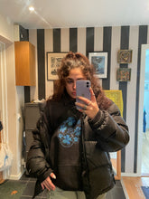 Load image into Gallery viewer, Woman wearing Black Oversized Bubbles Hoodie with Black North face Jacket