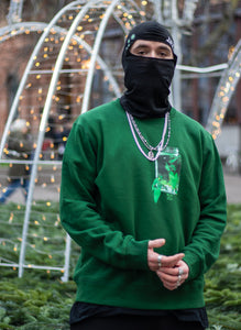 man wearing 100% cotton green think outside the jar sweater with black bubbles balaclava