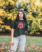 Load image into Gallery viewer, woman wearing green oversized stress graphic t-shirt