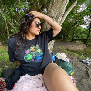 woman wearing oversized black rainbow bubbles pride t-shirt
