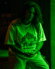Load image into Gallery viewer, woman wearing oversized white roboflower v3 graphic t-shirt in greenlight