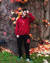 Load image into Gallery viewer, man wearing red mindcontrol graphic hoodie with green Jordan 1s